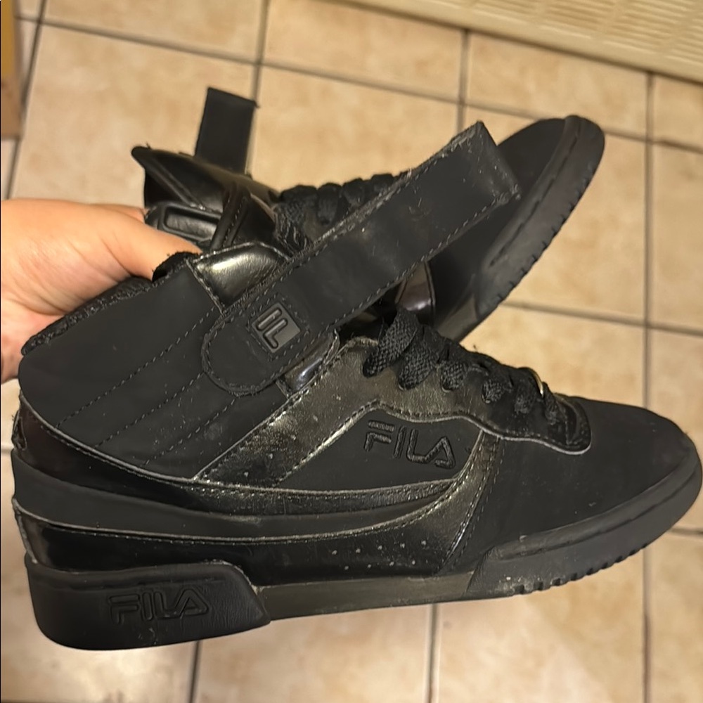 Fila WOMEN’s Black High-Top Sneakers